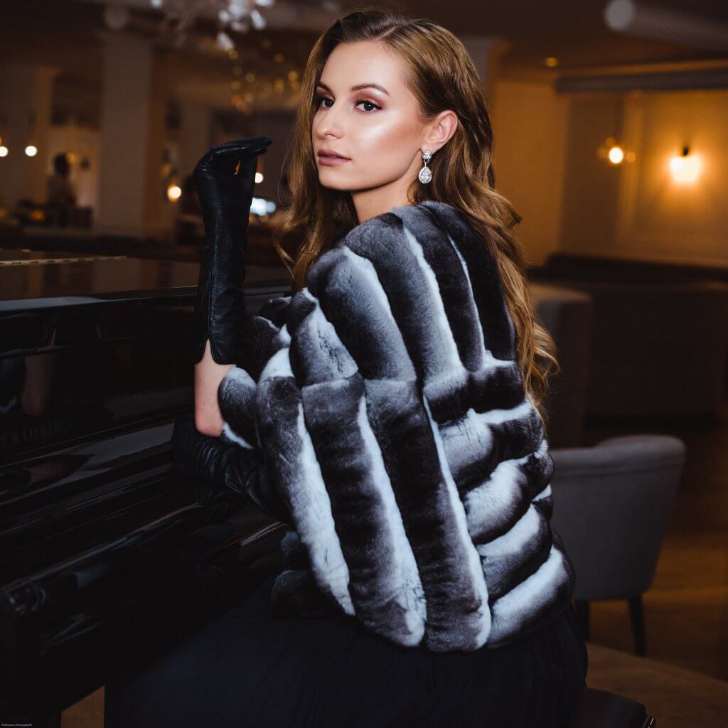 FurbySD campaign portrait in a silver and charcoal fur jacket