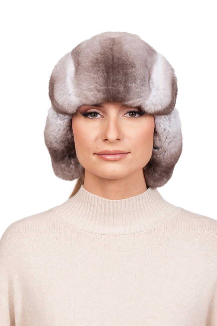 Stylish beige chinchilla fur trapper hat with cashmere, perfect for cold weather fashion.