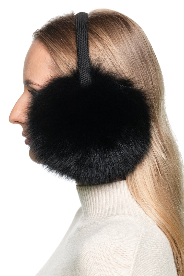 Side profile views of handmade black fox fur earmuffs with knitted band, elegant and soft large winter ear warmers.