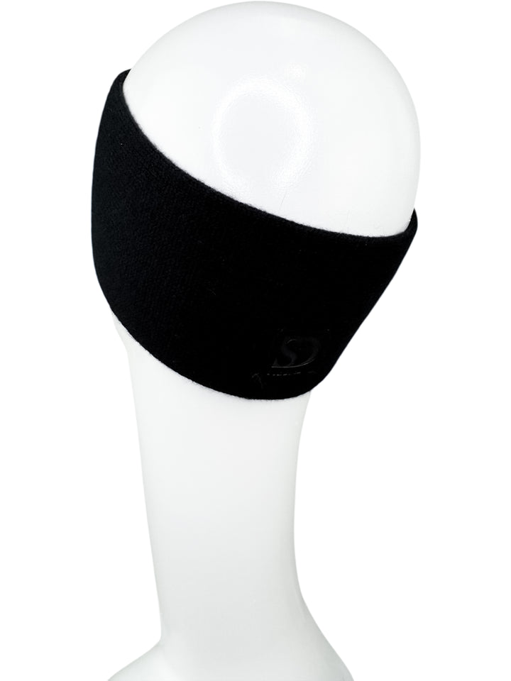 Left profile view of black cashmere headband with mink fur detail, luxury knit winter headpiece for women.
