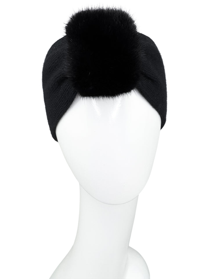 Black cashmere and merino wool headband with soft black mink fur center detail, elegant winter accessory on mannequin.