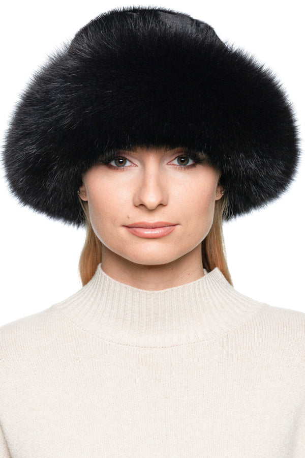 Close-up of a model wearing a luxurious Black Fox And Pony Fur Fedora Hat with a wide fur brim, showcasing elegance and warmth.