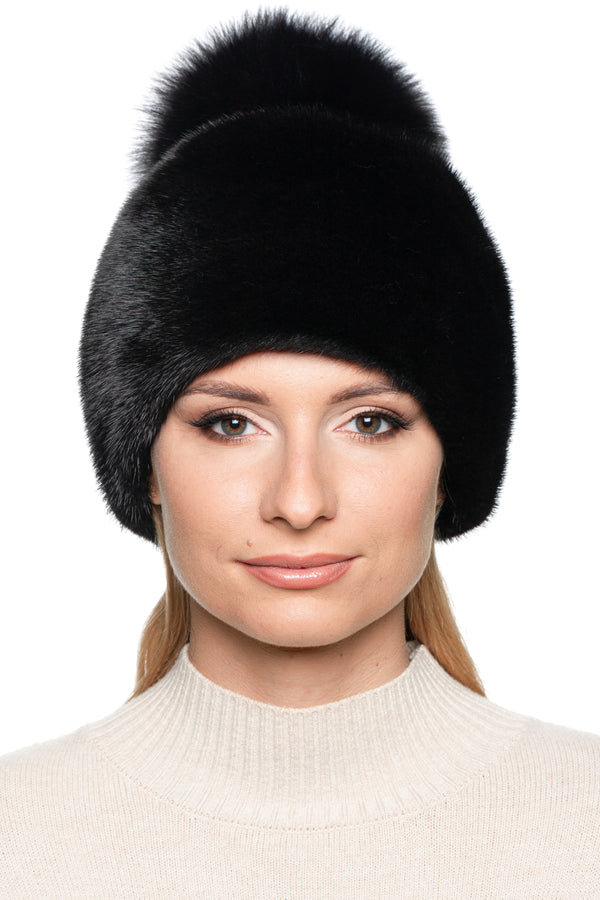 Front view of black mink fur beanie hat with plush fox fur pom pom – full mink fur luxury winter hat, handmade for women.