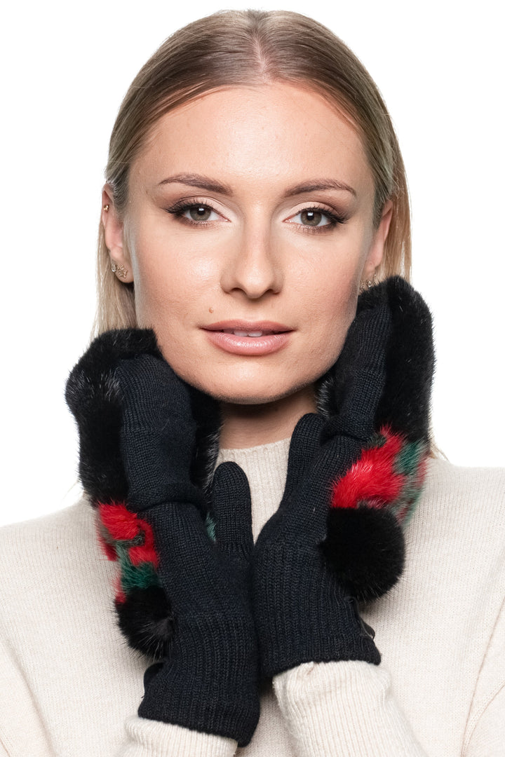 Side view of luxury black mink fur flip top mittens with colorful red and green wool knit pattern.