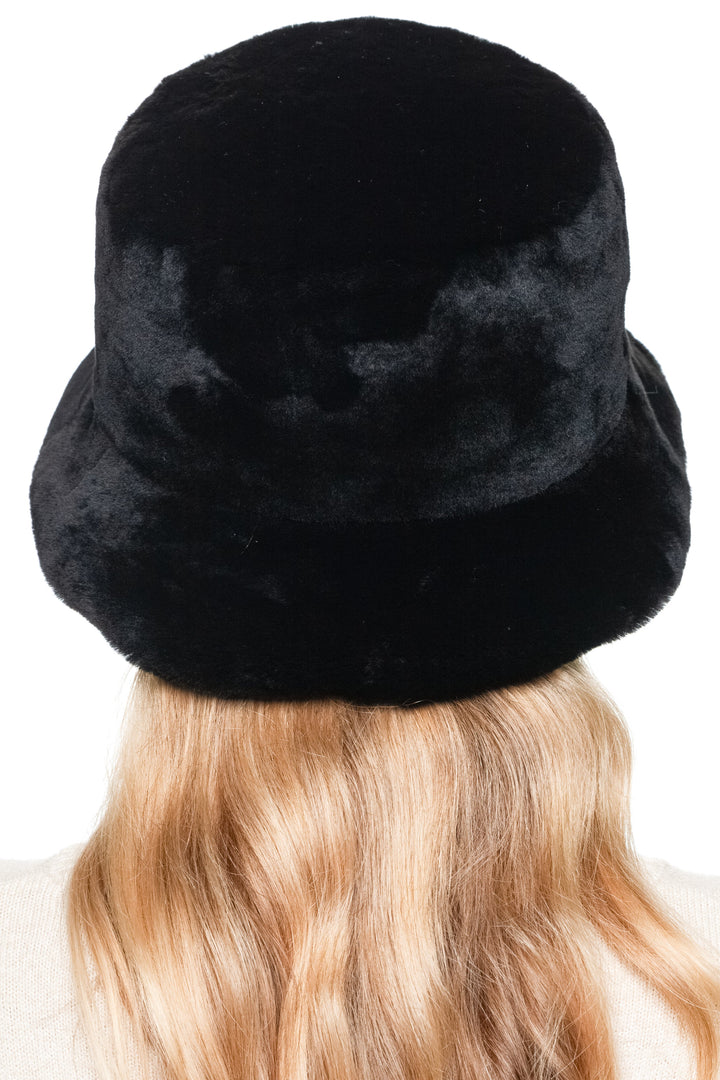 Back view of Black Mouton Lamb Fur Bucket Hat, genuine lamb fur winter hat for women, soft plush texture, handmade luxury accessory.
