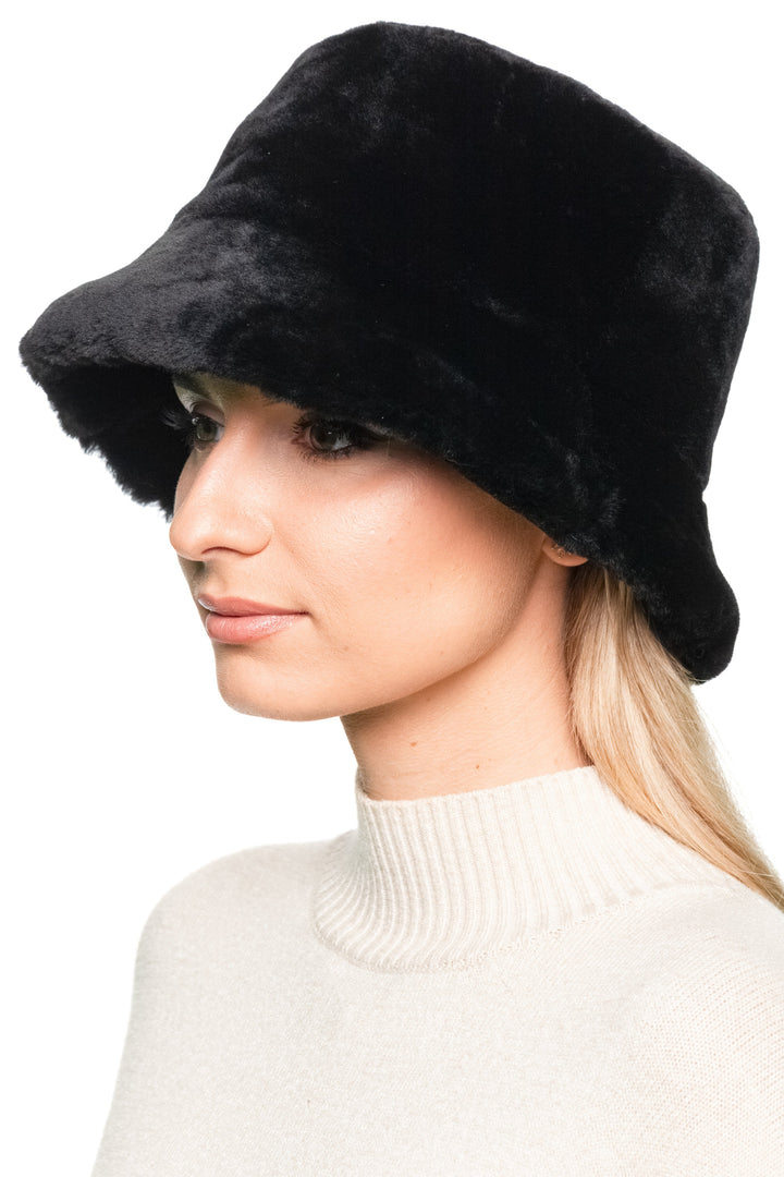 Side angle of Black Mouton Lamb Fur Bucket Hat, elegant plush lamb fur bucket hat for women, warm vintage-inspired winter style.