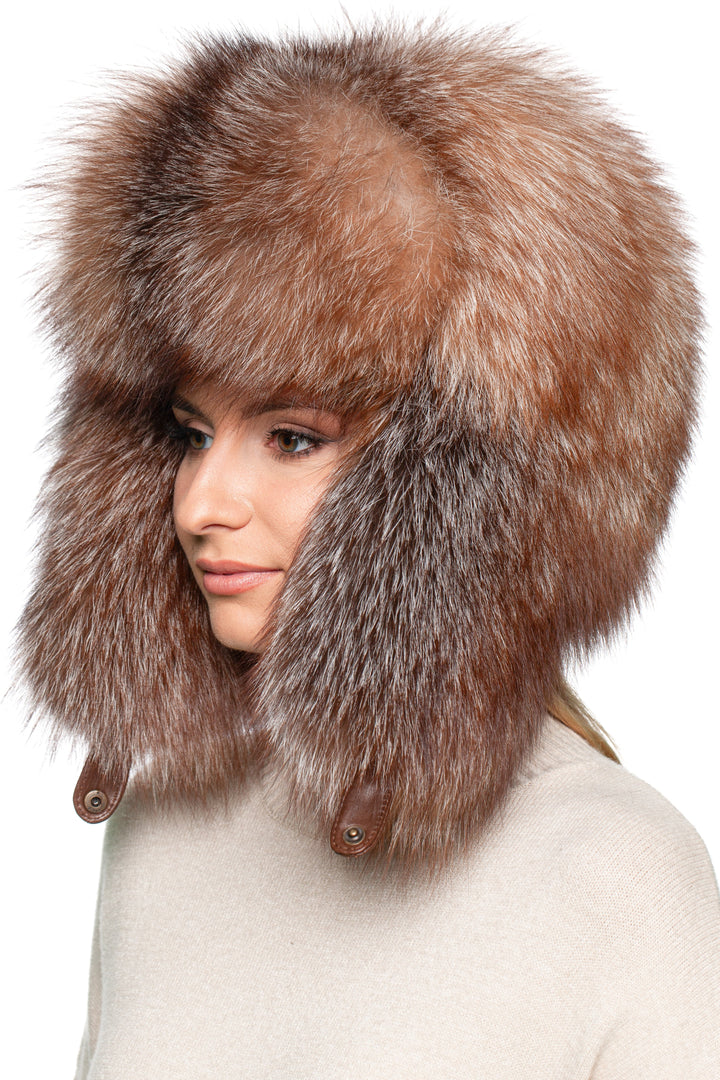 Side angle of real Frost Fox Fur Ushanka Trapper Hat – fluffy brown amber full fur winter hat with chin strap, unisex cold weather ski cap.
