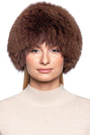 Model wearing a luxurious Brown Fox Fur Knit Beanie Hat, showcasing its rich color and fluffy texture.