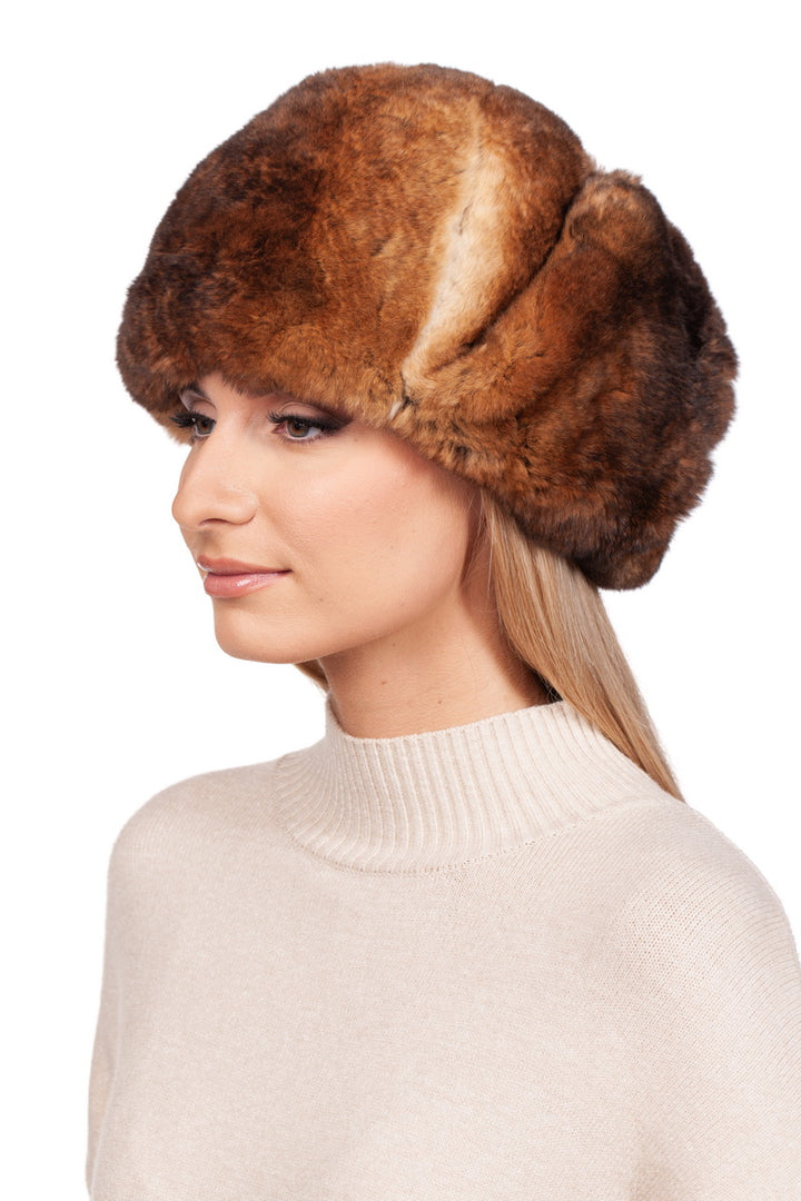 Profile Of Blond Woman Wearing Brown Rex Rabbit Fur Hat With Earflaps Up.