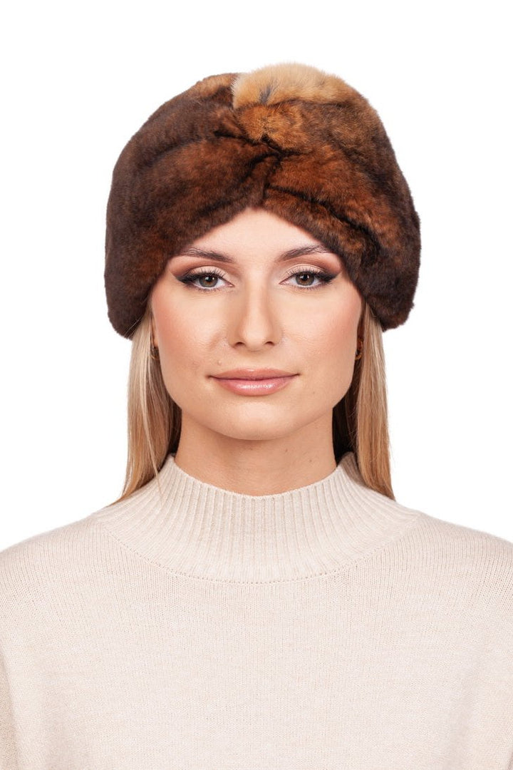 A person with long hair is wearing a stylish FurbySD Brown Rex Rabbit Fur Headband and a beige turtleneck sweater with cashmere lining, looking directly at the camera against a white background.