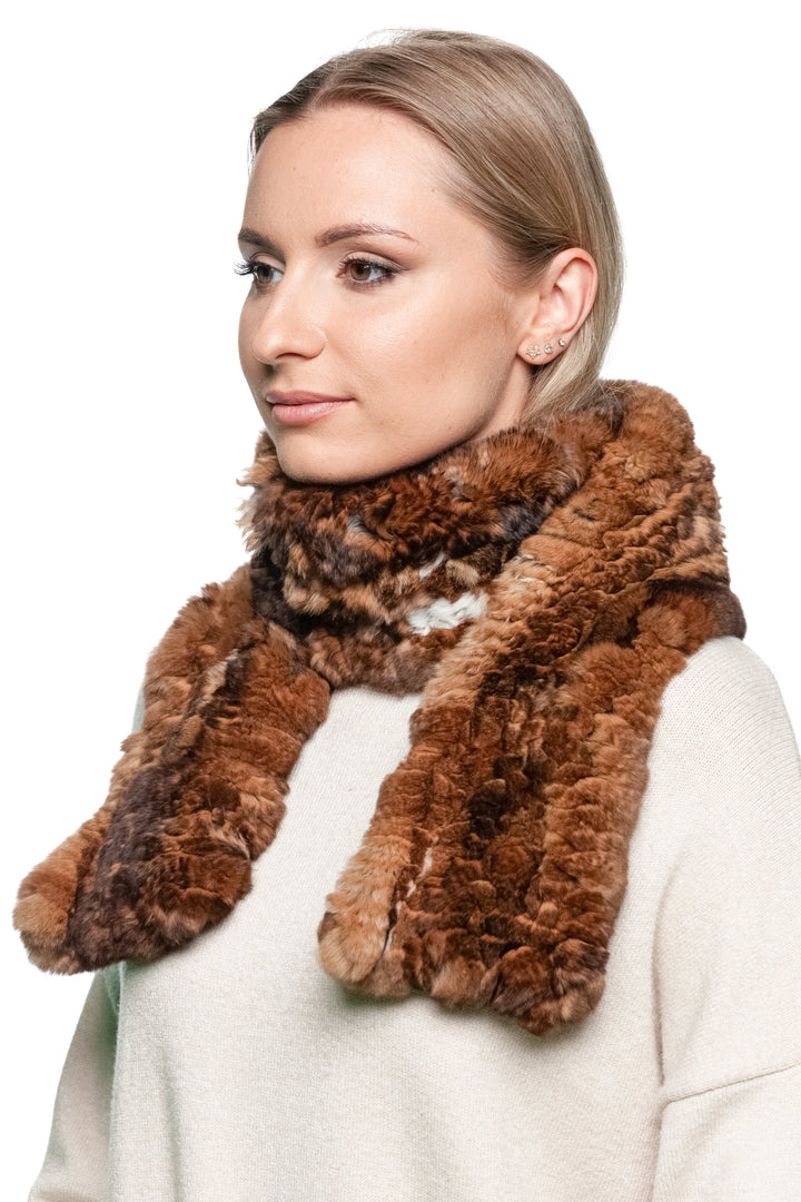 Three-quarter view of a woman modeling a brown rex rabbit fur scarf — handcrafted knitted fur scarf with elegant volume and warmth.