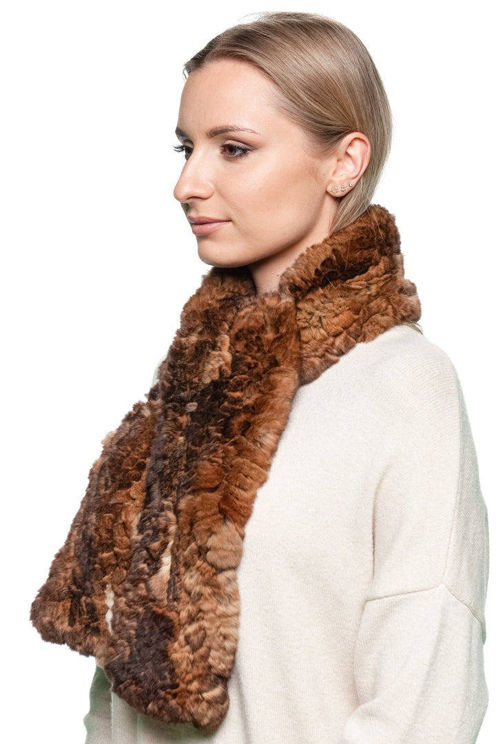 Profile view of woman in brown rex rabbit fur scarf, showing natural plush texture and hand-knit craftsmanship — chic winter fashion accessory.