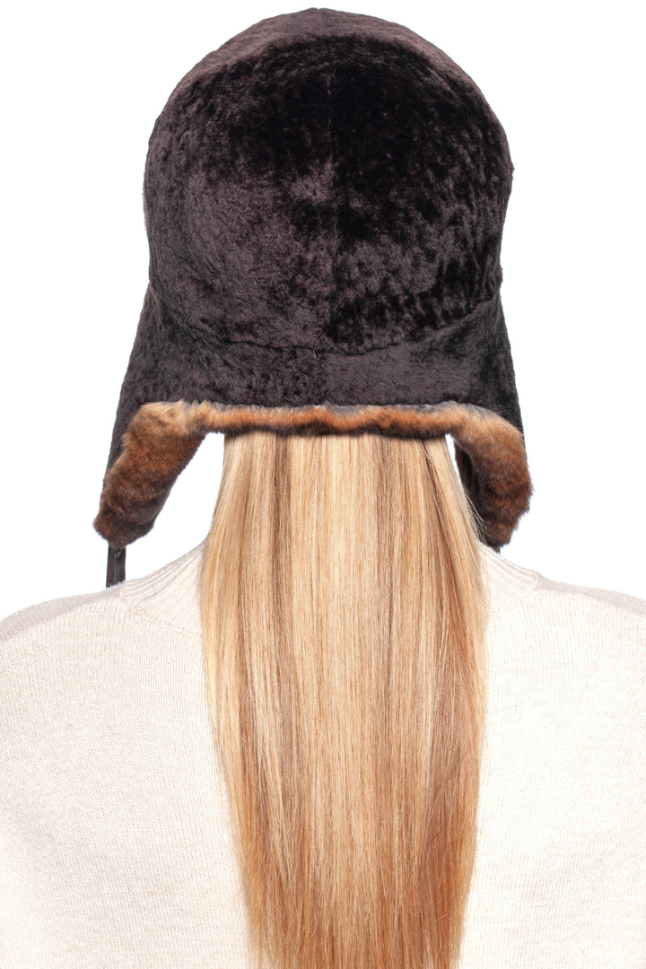 Back view of a luxurious brown lamb and rex rabbit fur trapper hat, showcasing plush material and stylish design.