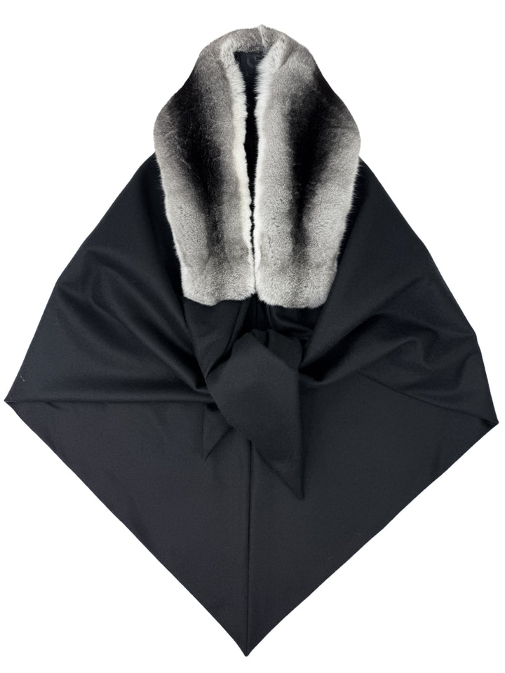 The Chinchilla Fur Trimmed Headscarf by FurbySD is a luxurious black wrap featuring a soft, white and gray faux fur trim reminiscent of chinchilla fur, designed flat with a pointed end.