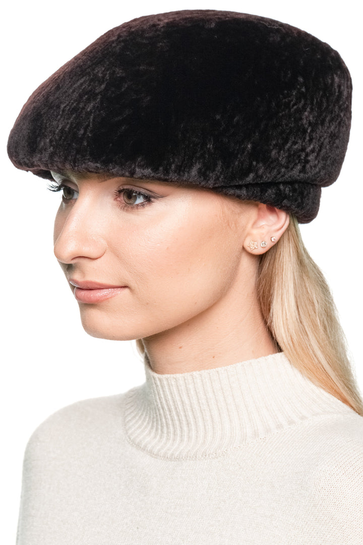 Dark Brown Lamb Fur Beret Hat in soft South African lamb fur, handmade by FurbySD, worn slightly tilted for a Parisian chic look.