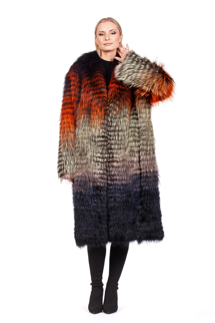 A person wearing the luxurious Ultralight Fox Fur Coat by FurbySD, featuring vibrant shades of orange, red, grey, and black, stands against a plain white background. The coat's textured, layered appearance perfectly complements the individual's light hair.