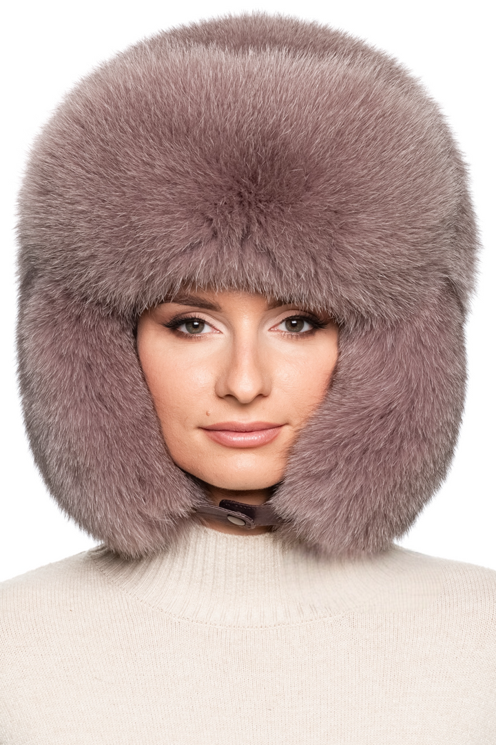 Front view of luxurious dusty pink fox fur trapper hat with voluminous earflaps closed, handmade winter ushanka for women by FurbySD.