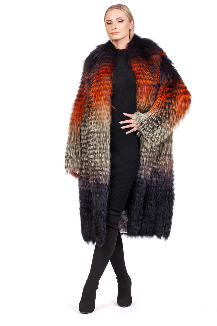 Adorned in the Ultralight Fox Fur Coat by FurbySD, the individual radiates elegance against a plain white backdrop with its vibrant shades of orange, red, gray, and black. Beneath this opulent outerwear is a sleek black ensemble that complements the lavish fox fur jacket perfectly.