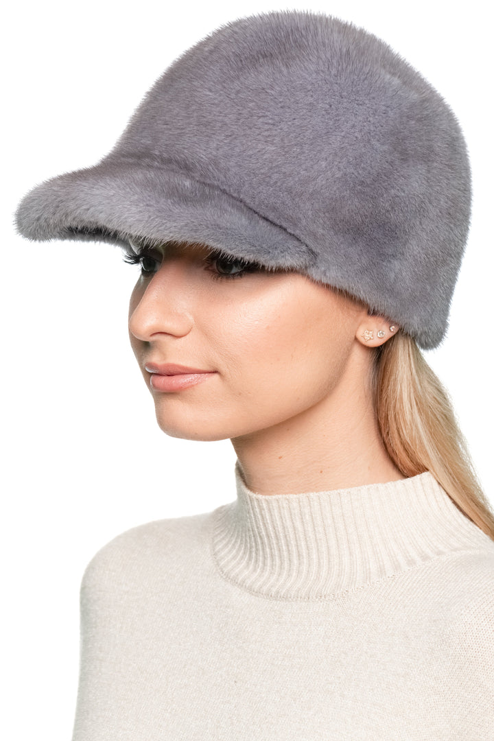 Side angle view of grey mink fur baseball cap with brim — luxury unisex winter hat handmade by FurbySD.