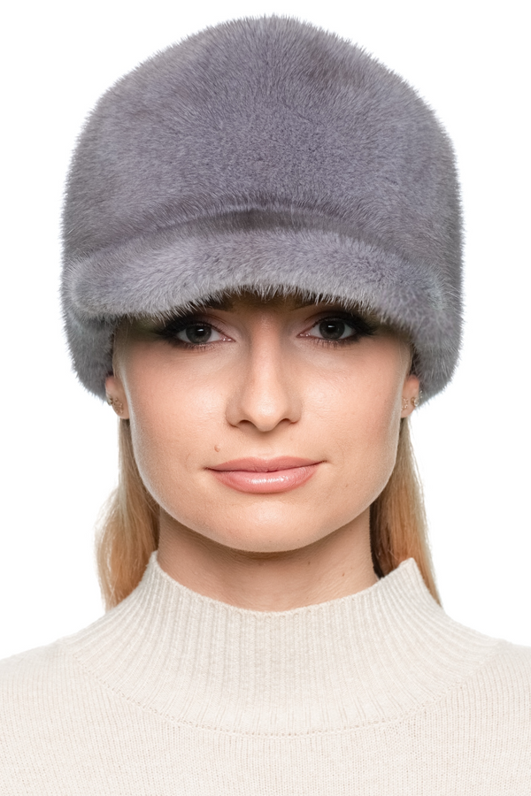 Front view of model wearing grey mink fur baseball cap — luxury winter hat with brim for men and women.
