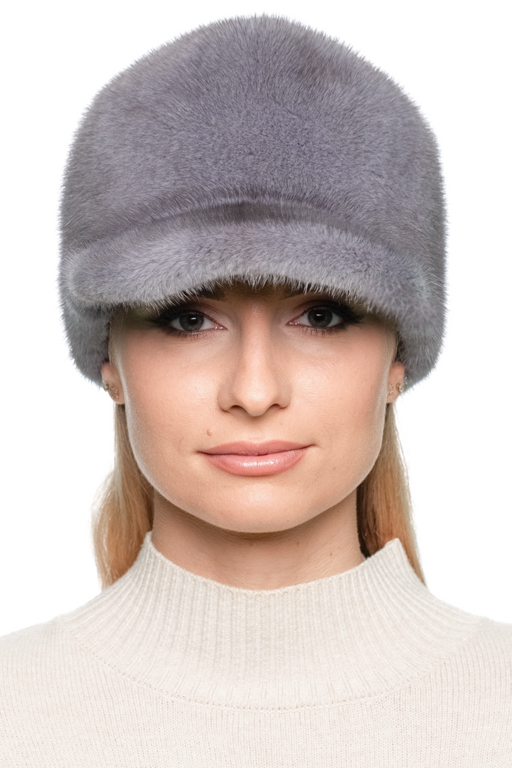 Front view of model wearing grey mink fur baseball cap — luxury winter hat with brim for men and women.