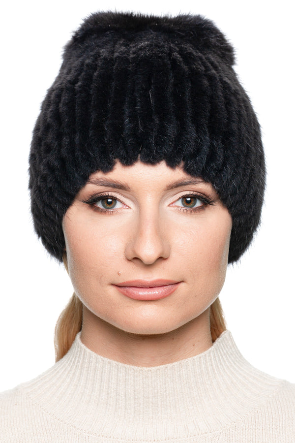 Front view of grey muskrat fur knitted beanie hat for women, handmade luxury winter accessory.