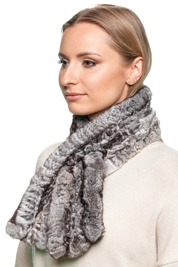 Fluffy grey Rex rabbit fur scarf shown on woman, hand-knitted real fur wrap for elegant cold-weather fashion.