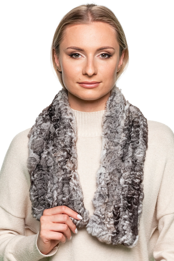 Grey Rex rabbit fur scarf shown open on woman, soft knitted real fur wrap for cozy and elegant winter outfits.