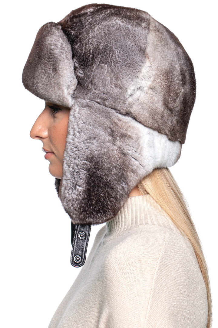 Side view of a luxurious Grey Rex Rabbit Fur Ushanka Hat, showcasing its soft texture and traditional earflap design.