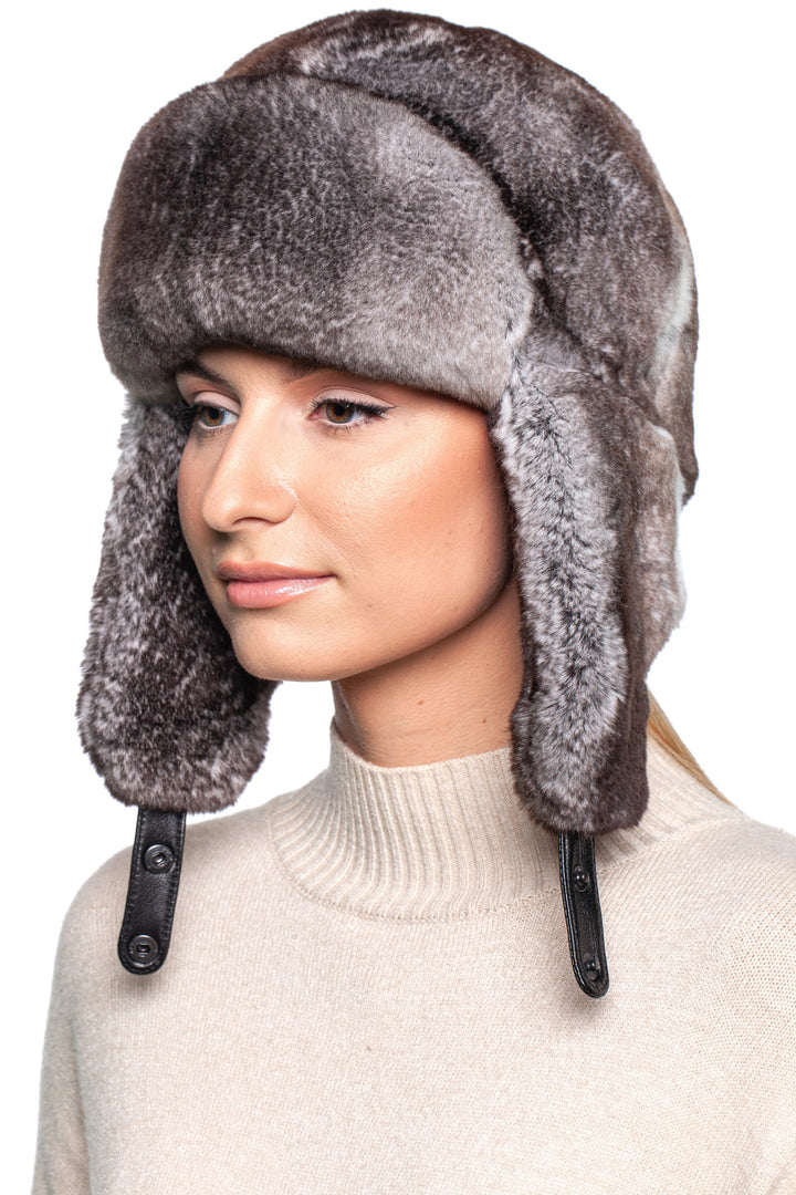 Grey Rex Rabbit Fur Ushanka Hat on model, showcasing earflaps and luxurious winter style.