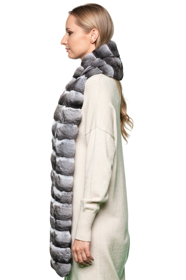 Side profile – woman modeling unisex chinchilla fur scarf, fluffy genuine fur winter wrap, luxury handmade accessory.