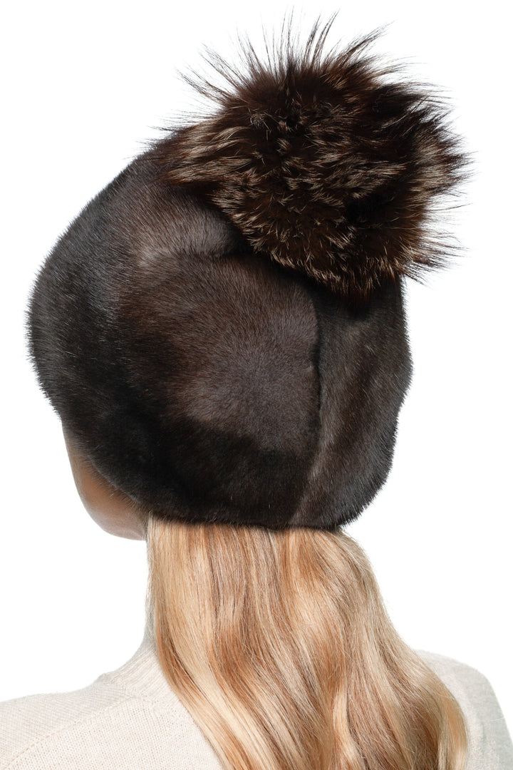 Back view of greyish brown mink fur hat with fluffy fox fur pom pom – handmade women’s luxury winter beanie from FurbySD