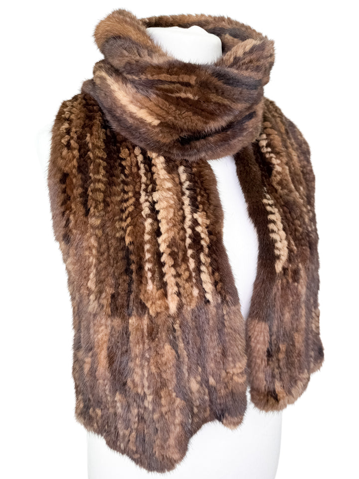 Brown mink knitted scarf on a white background