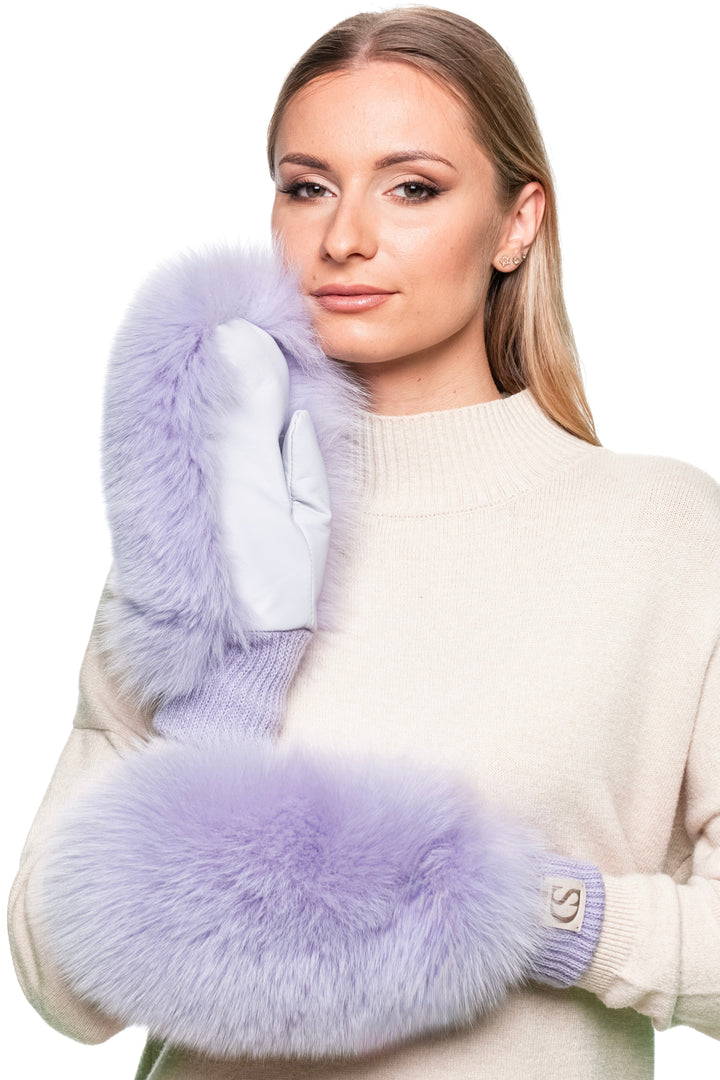 Side view of handmade purple fox fur mittens with knitted cuffs, real fur and leather winter gloves designed for women’s warmth and style.