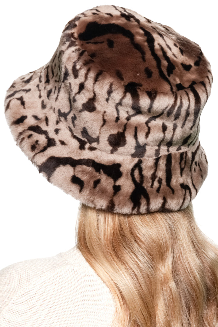 Back angle view of handmade shearling fur bucket hat in brown lamb fur with leopard print pattern, warm winter Panama style hat.