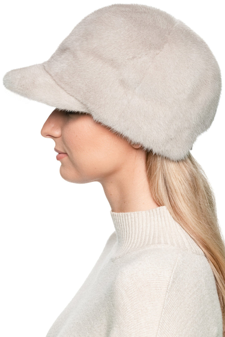 Side profile of light beige mink fur baseball cap, luxury real fur trucker-style hat with brim, handmade warm winter accessory by FurbySD.