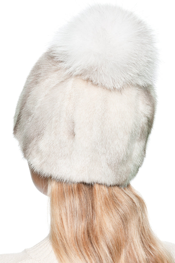 Back view of luxury light beige mink fur hat with white fox fur pom pom, handmade patchwork fur beanie, soft real fur hat for women, stylish winter accessory.