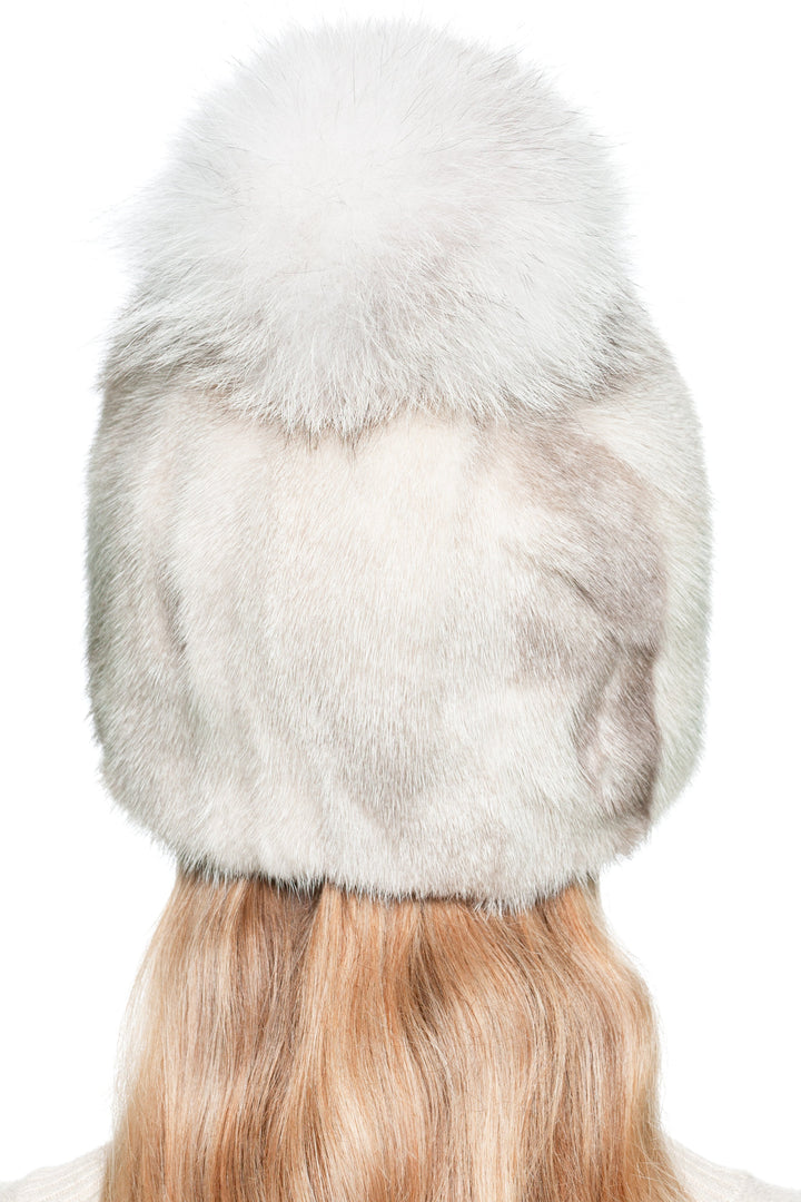 Handmade light beige patched mink fur hat with fluffy fox fur bobble, elegant real fur winter beanie for women, warm luxury hat with natural mink texture.