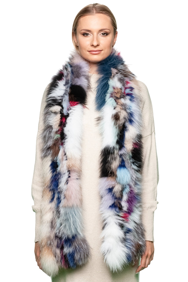 Woman wearing a multicolored fox fur scarf on a white background