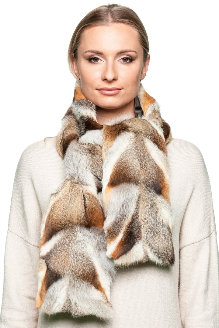 Model wearing genuine red fox fur scarf wrapped around neck, warm unisex luxury winter accessory in soft brown and ivory fur tones.