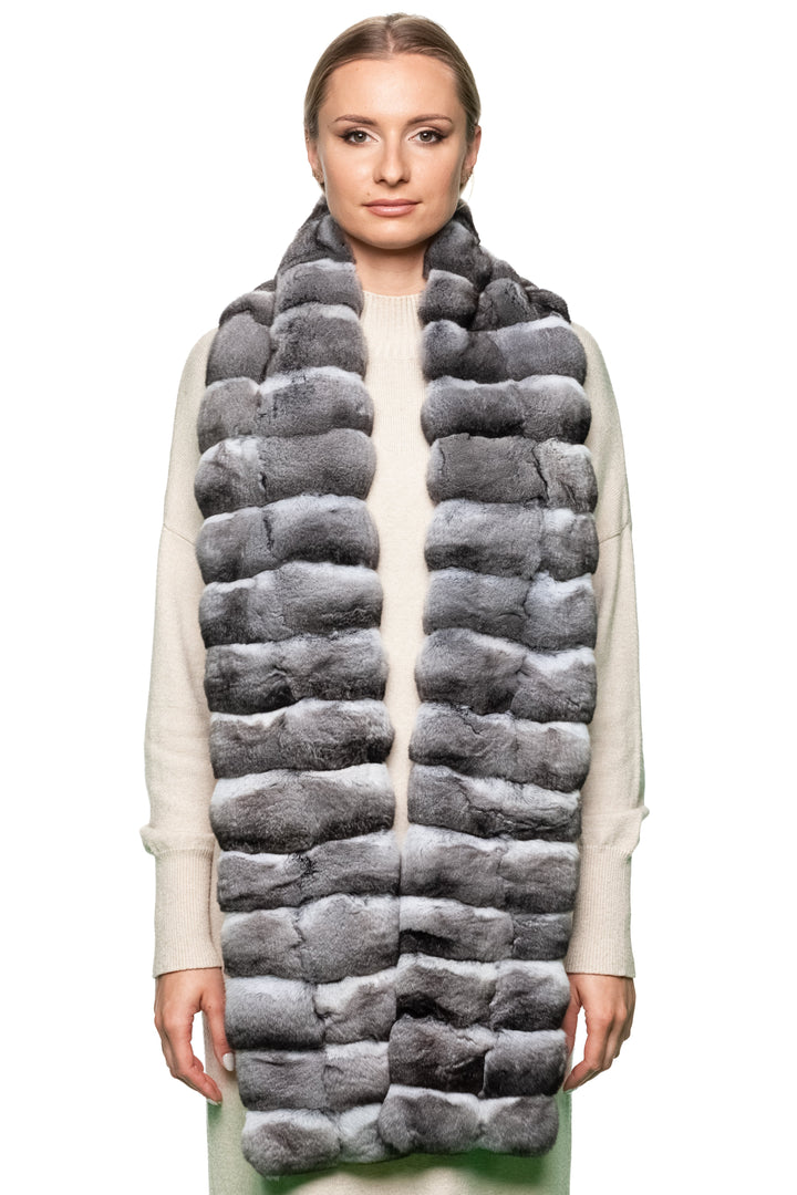 Luxury styling – model showcasing genuine chinchilla fur scarf in soft grey, handmade unisex winter fashion piece.