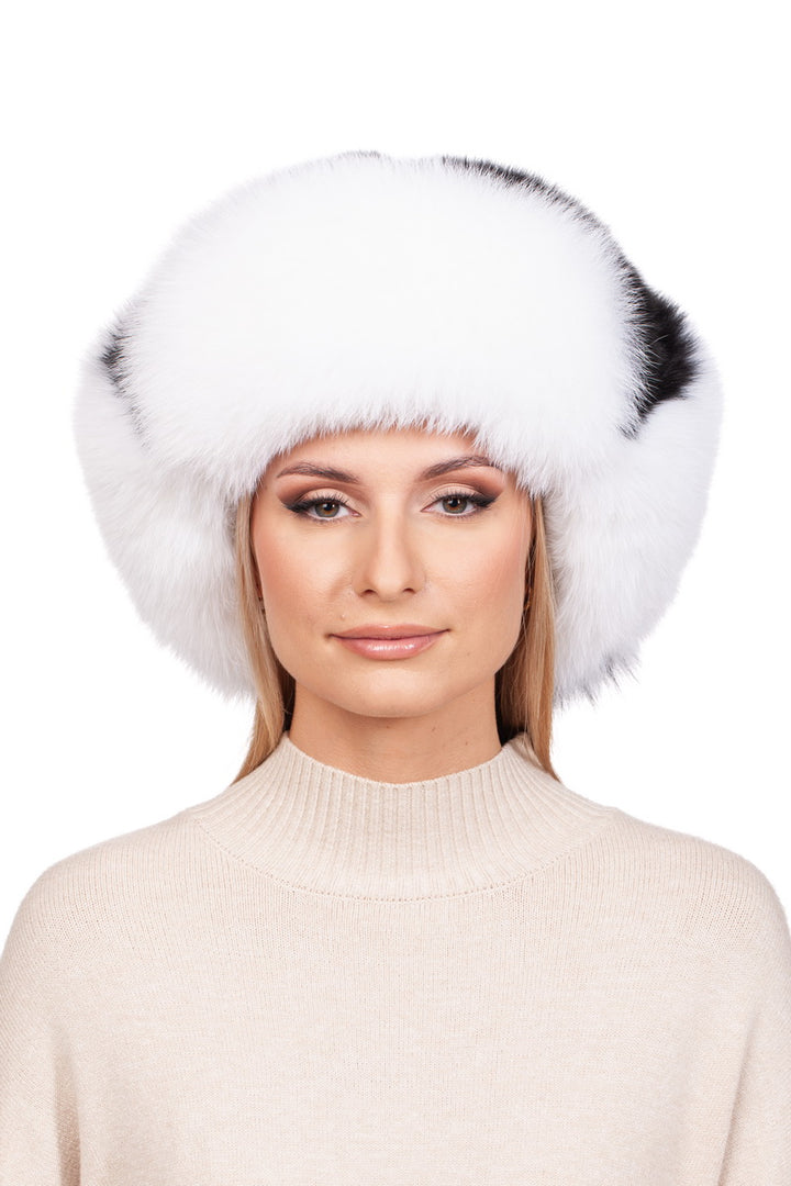 A person wearing a large, fluffy Fox Fur Ushanka Trapper Hat by FurbySD and a beige turtleneck sweater, showcasing the ultimate winter essential.