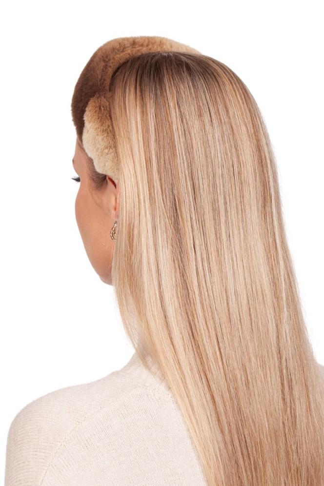 A woman with long, straight blonde hair models an exquisite FurbySD accessory—a Brown Sheared Mink Fur Hairband. With her back to the camera, she highlights both her hairstyle and the texture of the headband while partially revealing her cream-colored sweater.