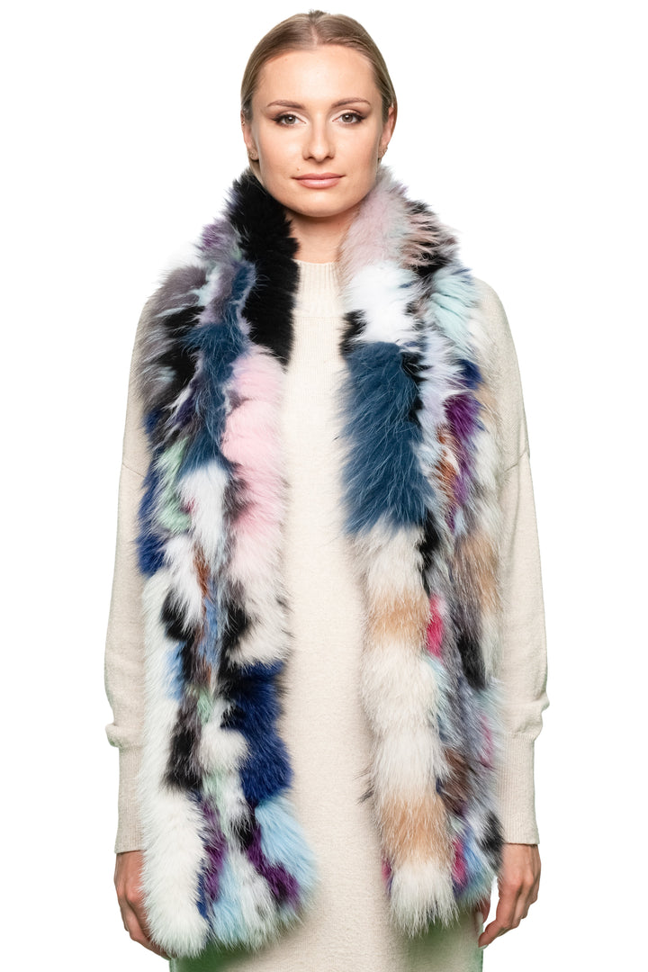 Woman wearing long multicolor fox fur scarf draped over shoulders, handmade by FurbySD, styled with cream knit dress.