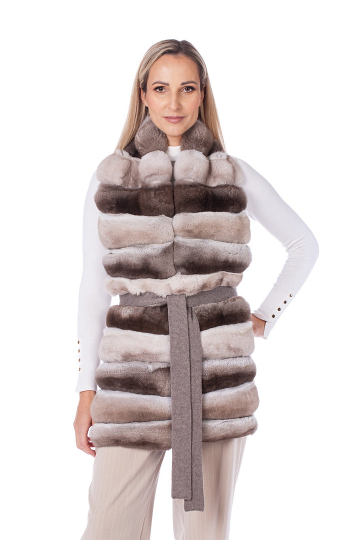 Chinchilla fur vest cinched with a belt for chic look