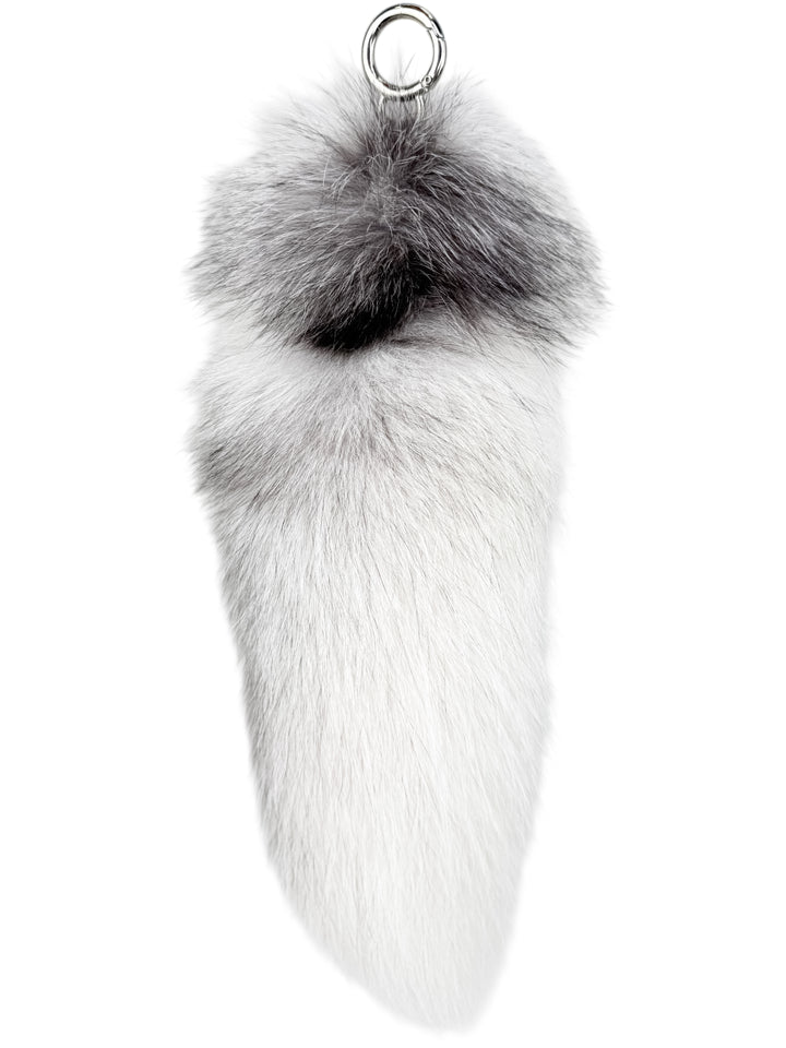 White frost fox fur pom tail charm with silver gradient — stylish real fur bag accessory and handmade keychain for luxury fashion lovers.