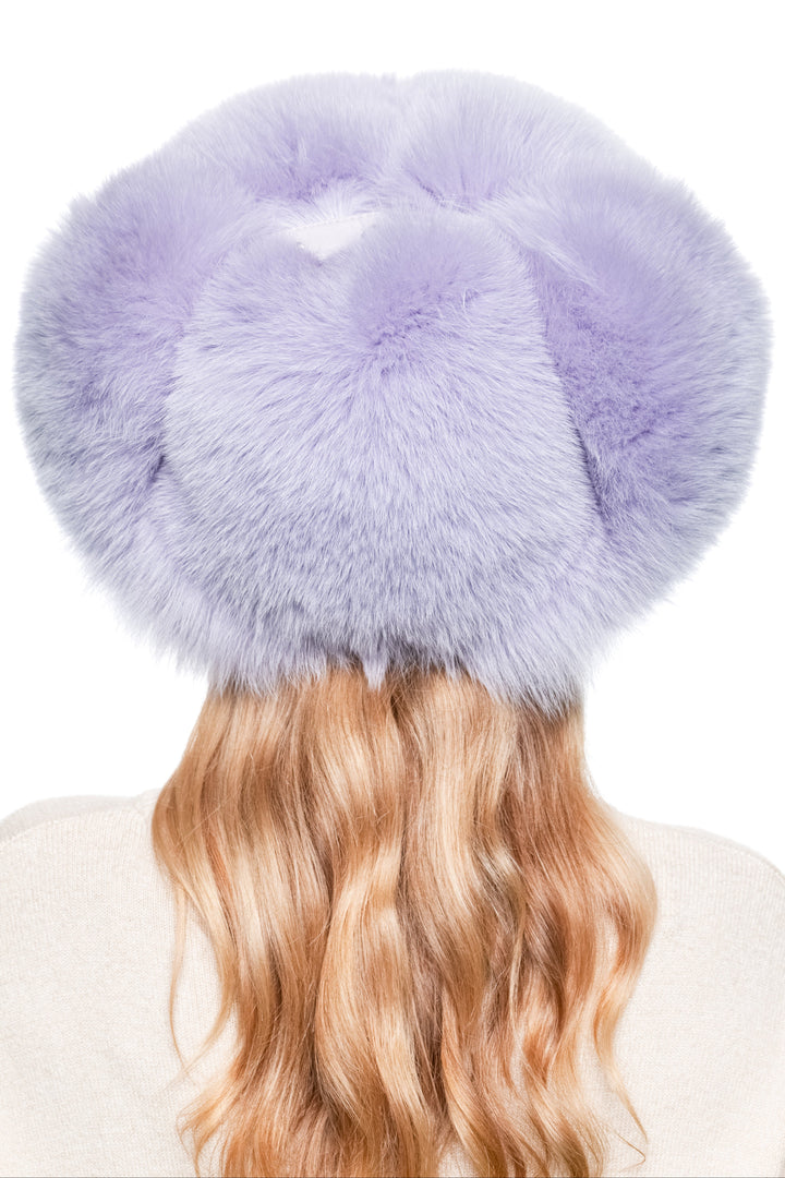 Crown detail of purple fox fur trapper hat, oversized fluffy design with earflaps, real fur ushanka for unisex winter fashion.