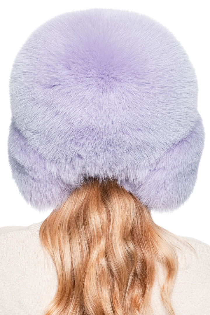 Luxury purple fox fur trapper hat seen from back-right angle – unisex Russian ushanka with earflaps, perfect for après-ski and winter fashion.