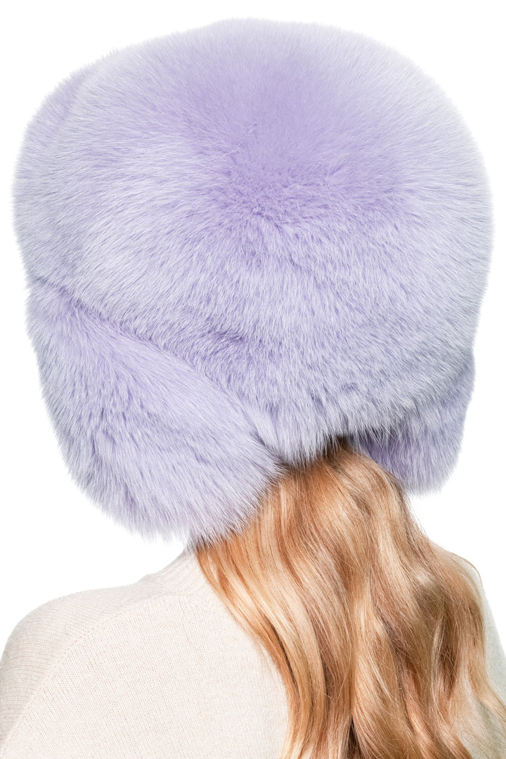 Profile view of purple fox fur ushanka hat – oversized unisex trapper cap with earflaps, designer real fur ski hat for cold weather.