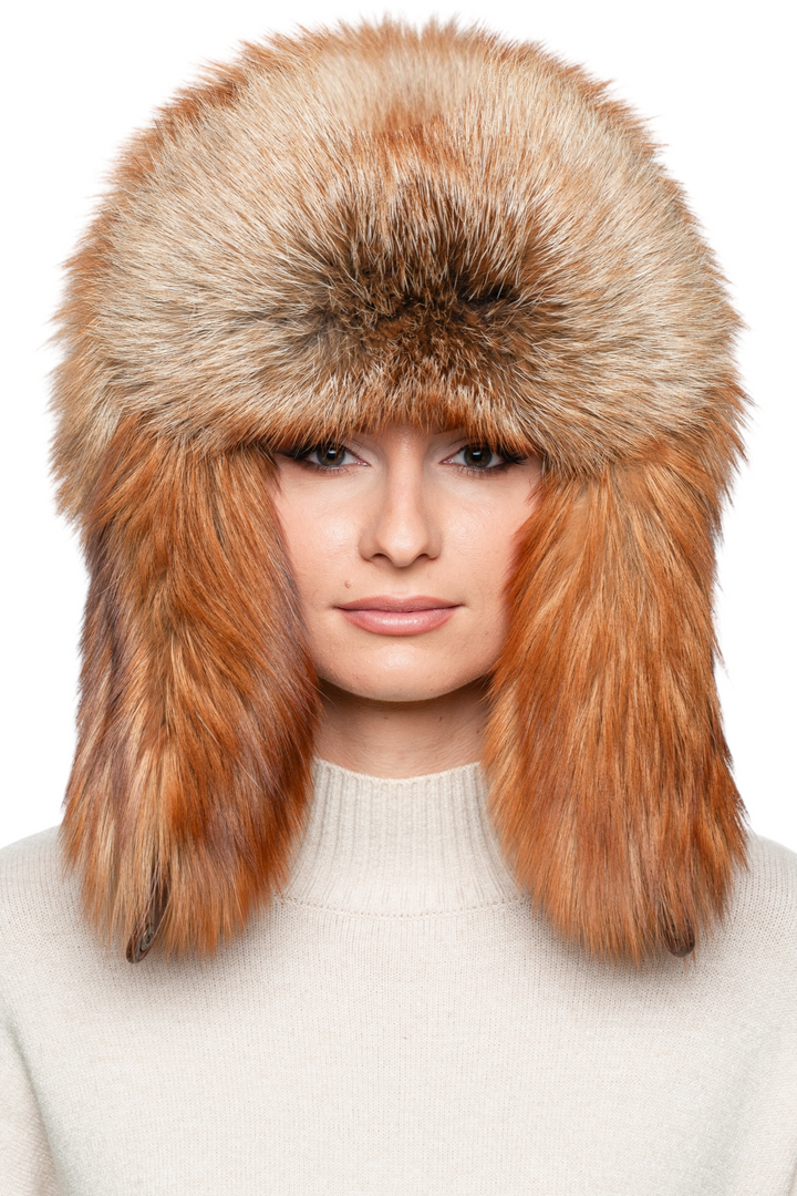Front view of genuine red fox fur ushanka hat, fluffy full-fur trapper hat with earflaps, unisex luxury winter shapka.